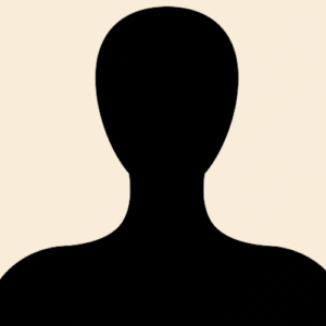 A simple, black silhouette of a person with no facial features, shown against a light beige background. The image is a generic placeholder for a profile or user photo.